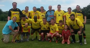 The allsorts celebrate a hard earned with after the game.