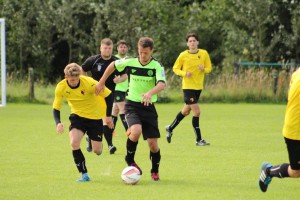 Full of energy as ever, Ben Kelly harries a Halifax player